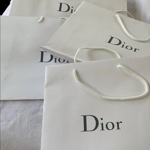 7 Dior shopping bags.
